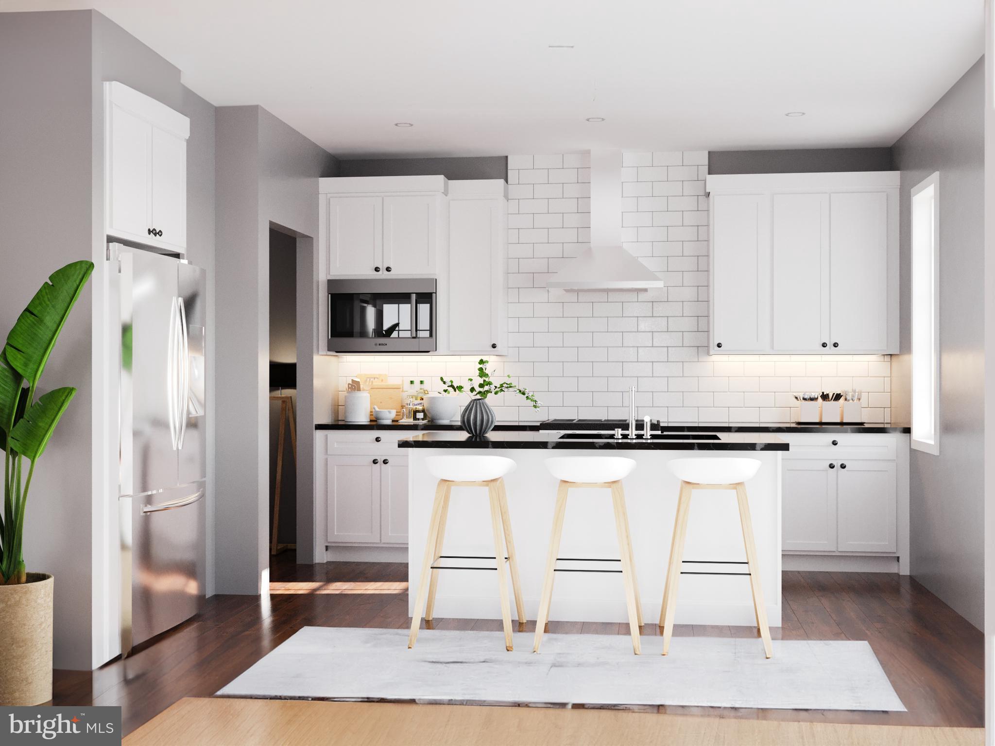 104 Merchant Avenue, Unit DARBY Mount Joy, PA 17552 - Photo 3 of 11 a kitchen with stainless steel appliances granite countertop a stove a sink and a refrigerator