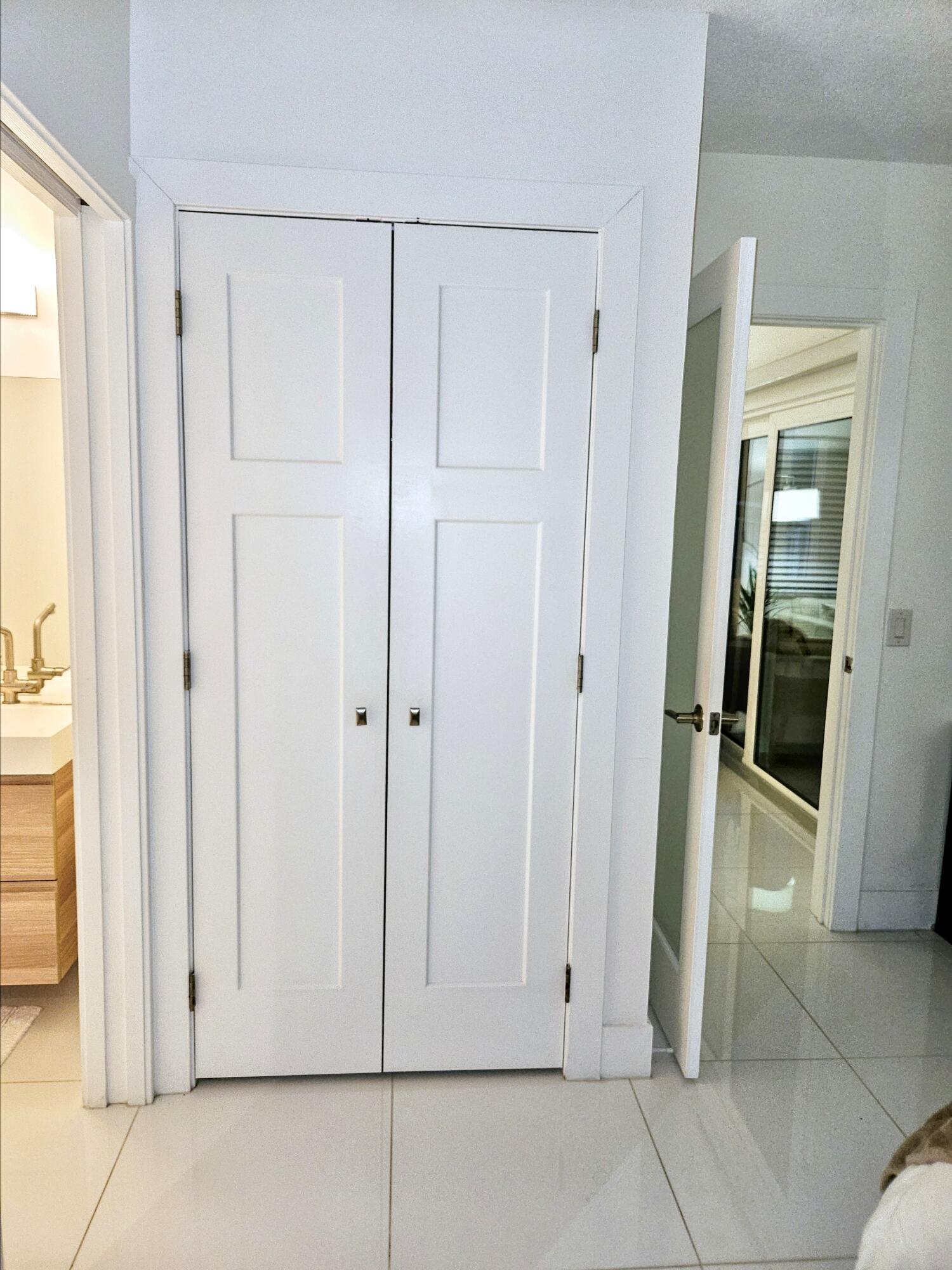6530 North Ocean Boulevard, Unit 1080 Ocean Ridge, FL 33435 - Photo 26 of 54 a view of an entryway with wooden floor