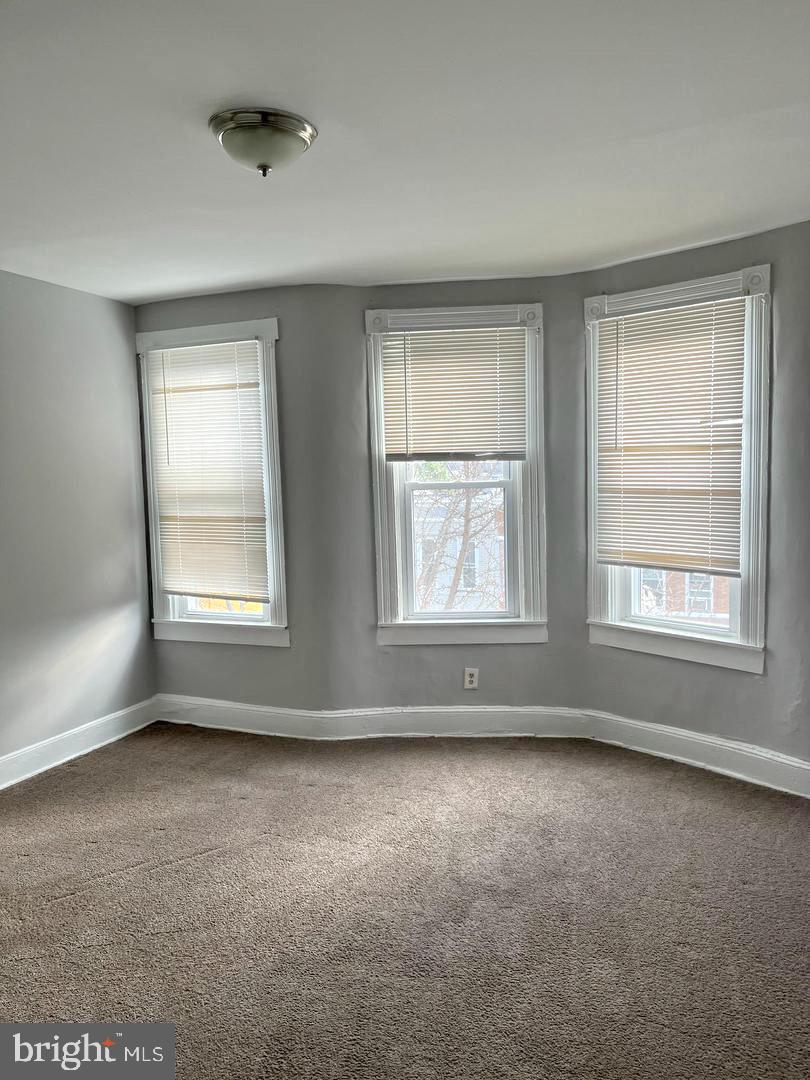 1904 Mosher Street Baltimore, MD 21217 - Photo 13 of 16 an empty room with windows