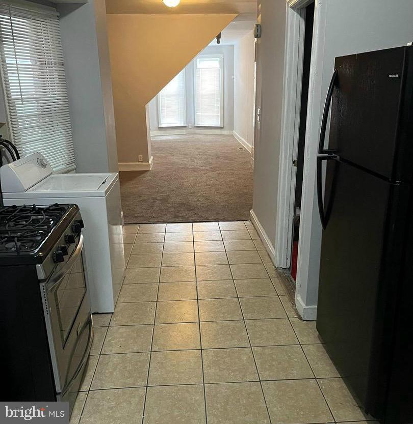 1904 Mosher Street Baltimore, MD 21217 - Photo 6 of 16 a bathroom with a granite countertop sink toilet and shower