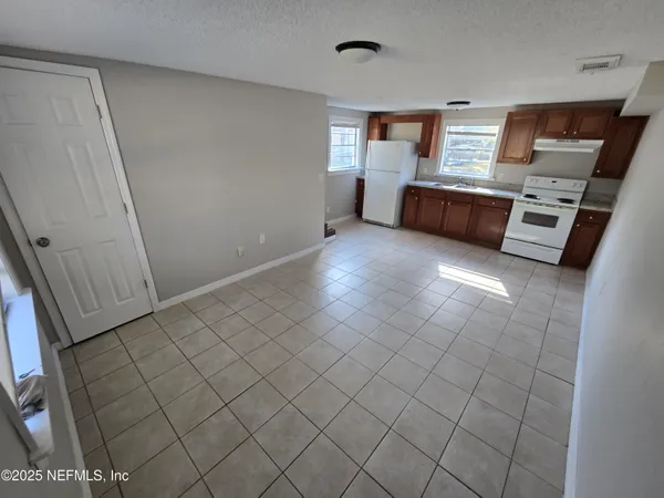 a view of a livingroom with a furniture
