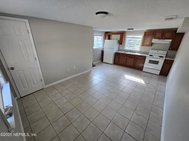 a view of a livingroom with a furniture