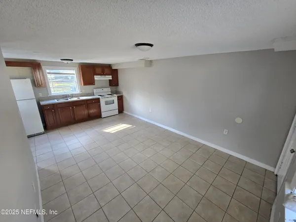 a large white room with a large window