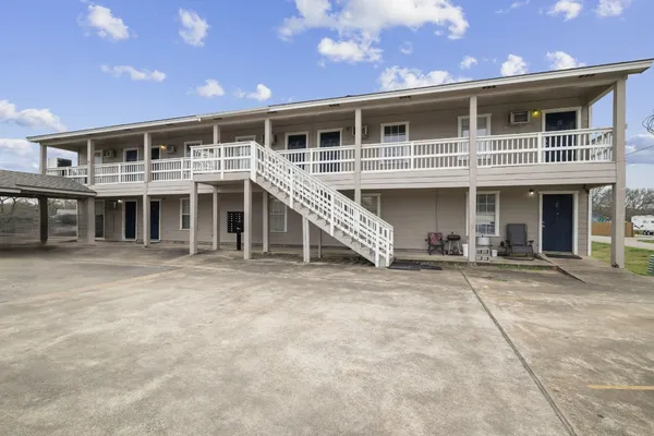 a front view of a house with a porch
