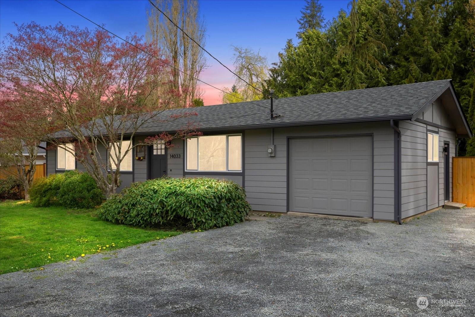 14033 Connelly Road Snohomish, WA 98296 - Photo 1 of 33 a front view of a house with garden