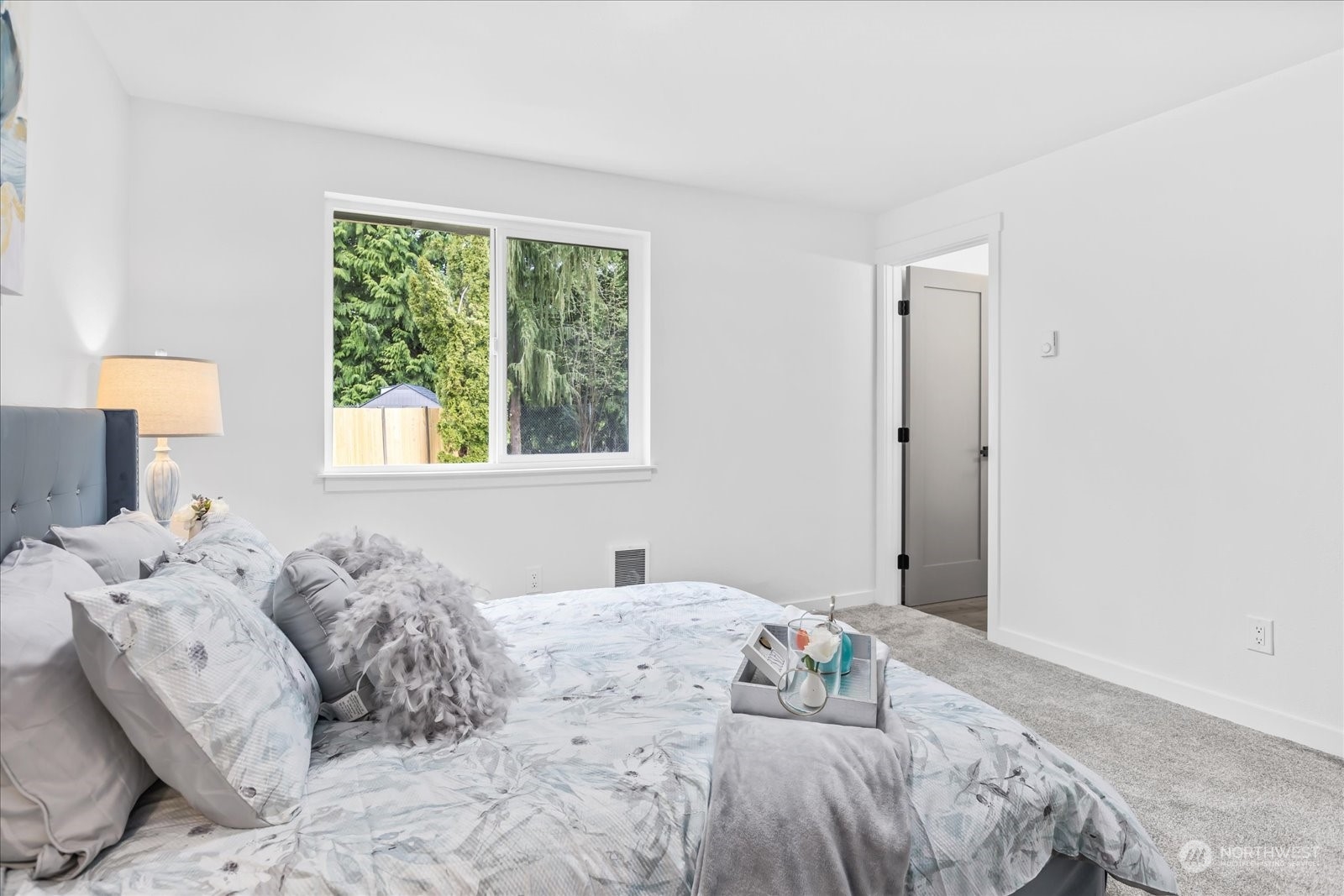 14033 Connelly Road Snohomish, WA 98296 - Photo 13 of 33 a bedroom with a large bed and a window