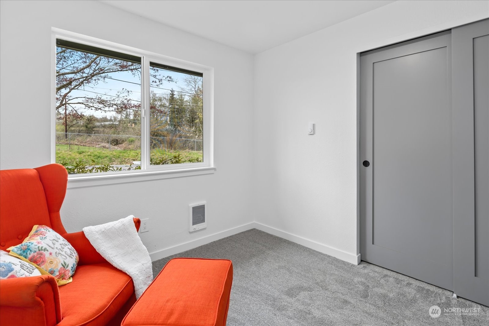 14033 Connelly Road Snohomish, WA 98296 - Photo 18 of 33 a room with furniture and a window