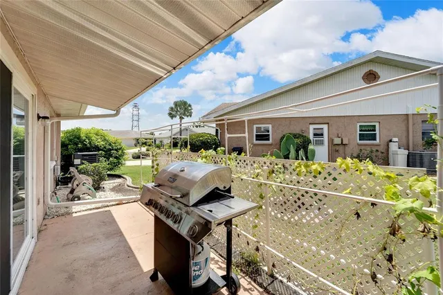 a view of a yard with furniture