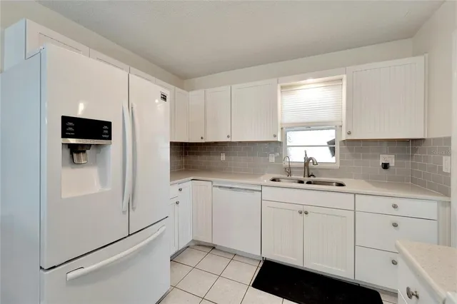a view of a kitchen and a microwave