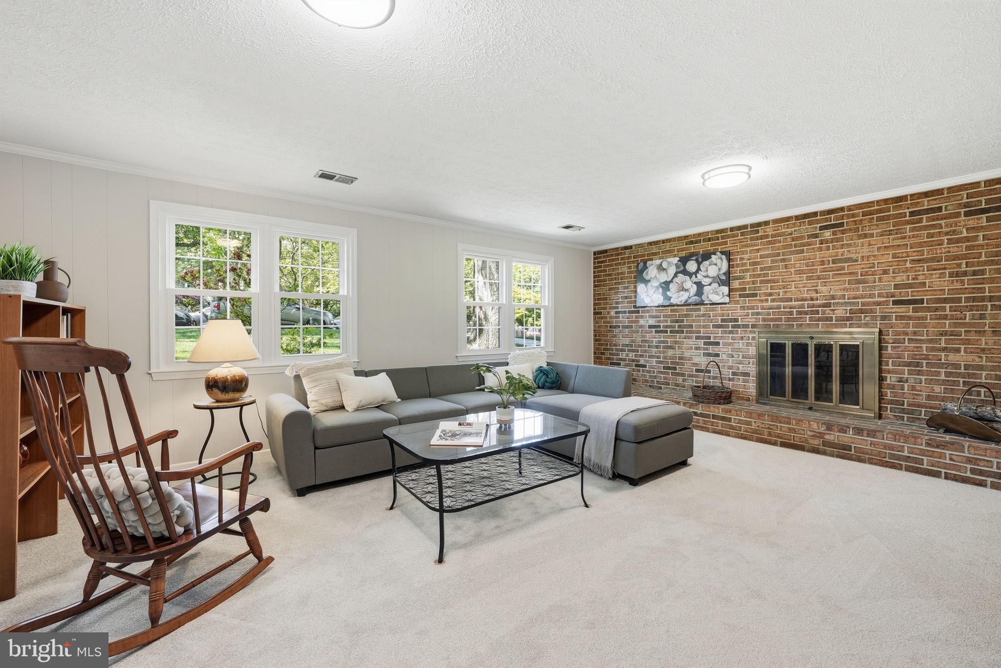 2327 Riviera Drive Vienna, VA 22181 - Photo 16 of 42 Family room with new carpet and FP