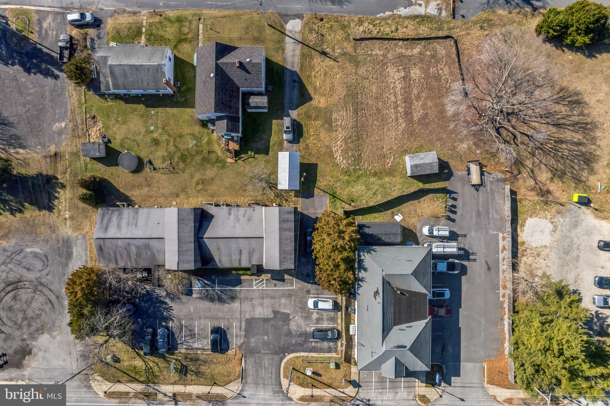 4870 Calvert Drive St. Leonard, MD 20685 - Photo 13 of 13 a aerial view of multiple houses with outdoor space