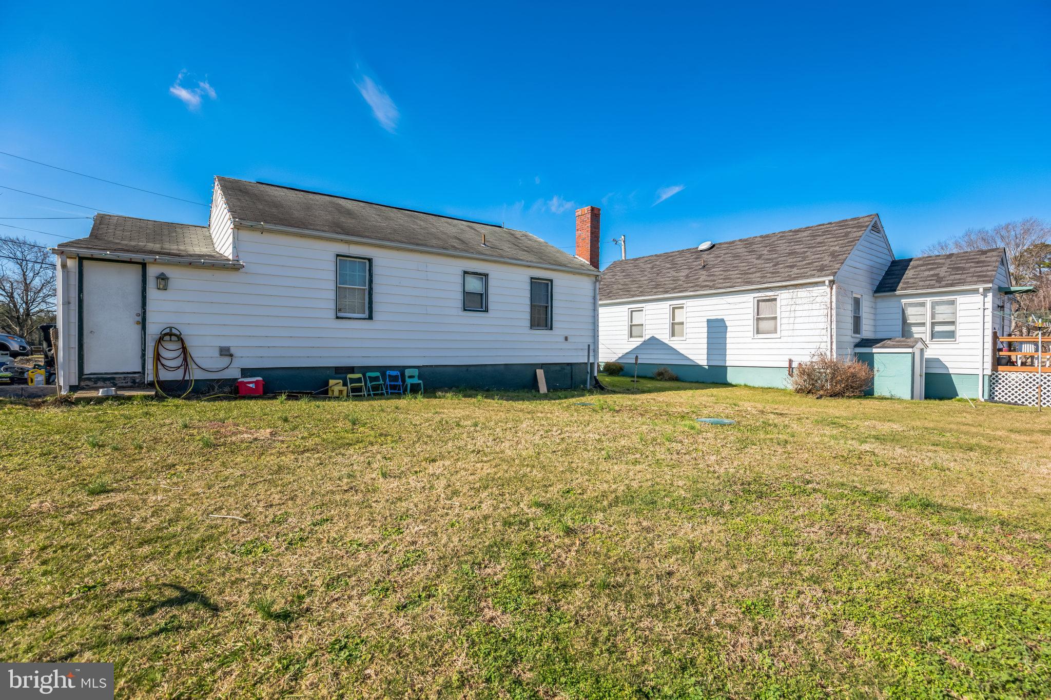 4870 Calvert Drive St. Leonard, MD 20685 - Photo 4 of 13 a house view with a backyard space