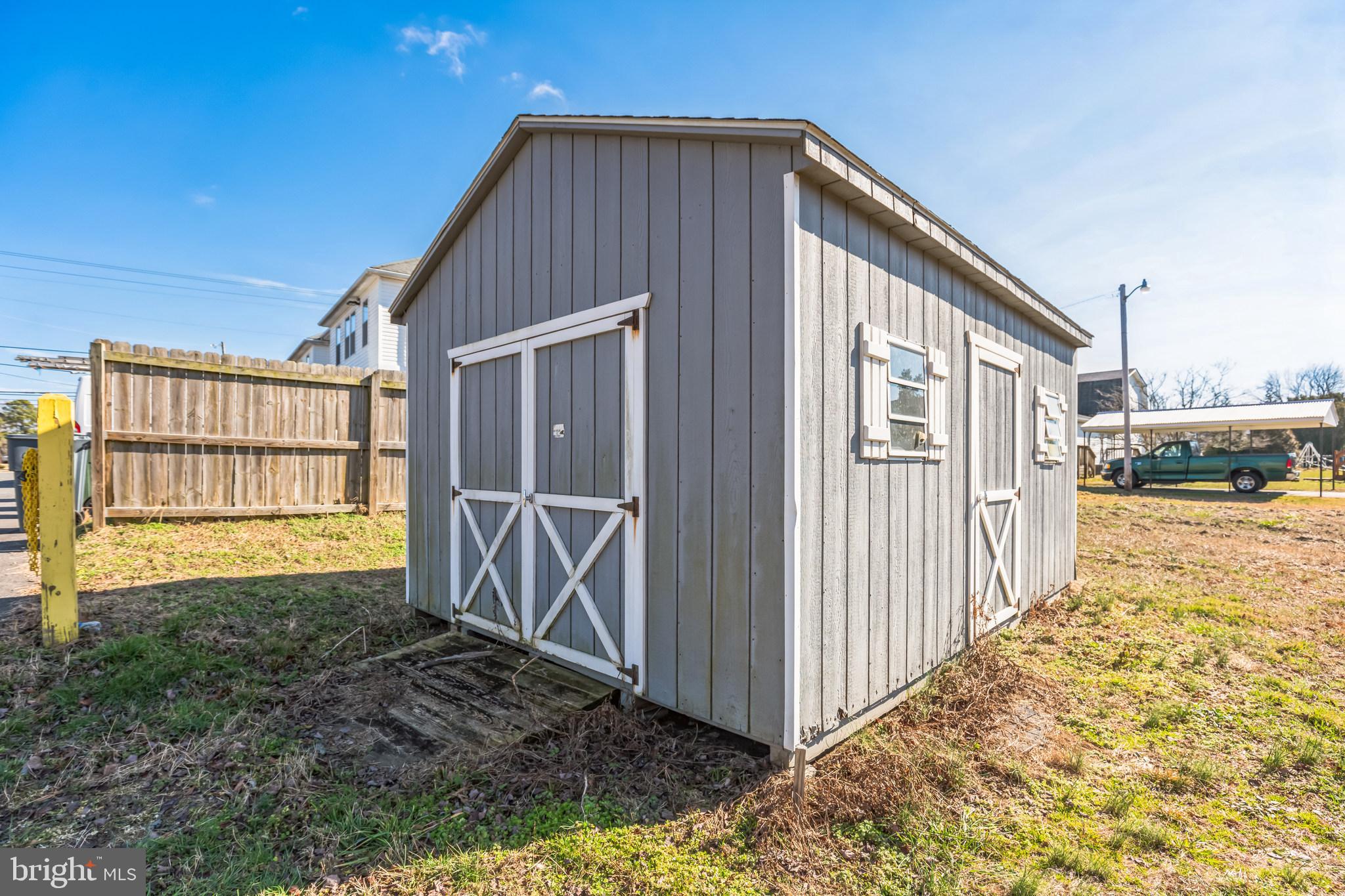 4870 Calvert Drive St. Leonard, MD 20685 - Photo 6 of 13 a house view with a backyard