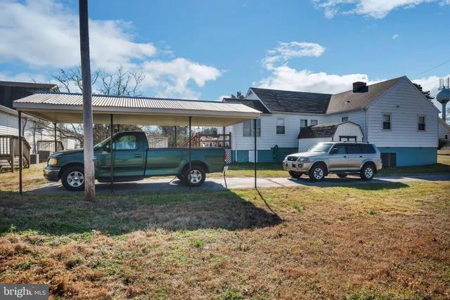 a car parked in front of a house