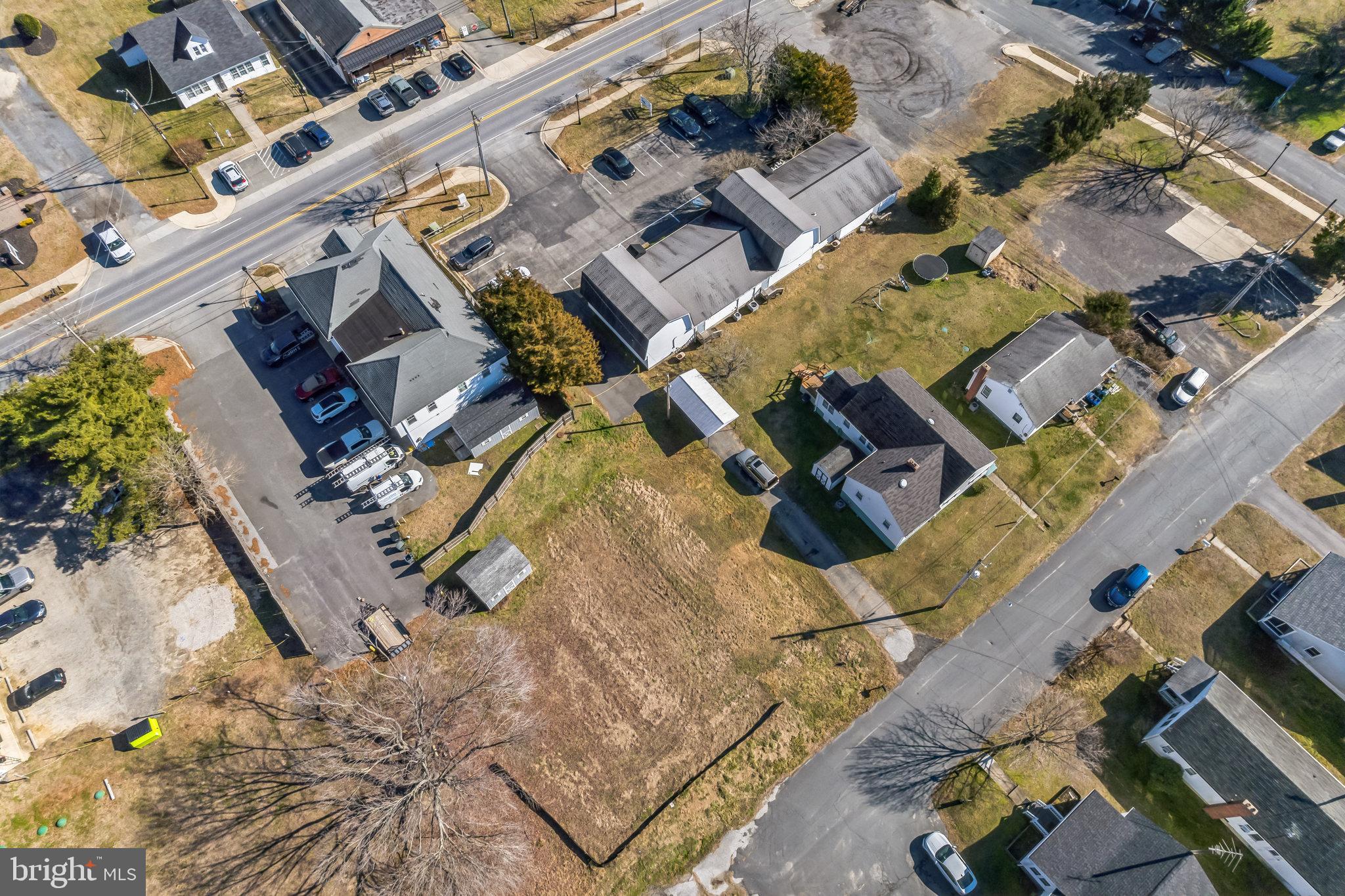 4870 Calvert Drive St. Leonard, MD 20685 - Photo 9 of 13 an aerial view of a house with a yard