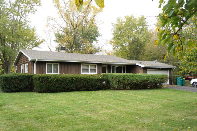 39-w257 McDonald Road St. Charles, IL 60175 - Photo 1 of 5 a front view of a house with a yard