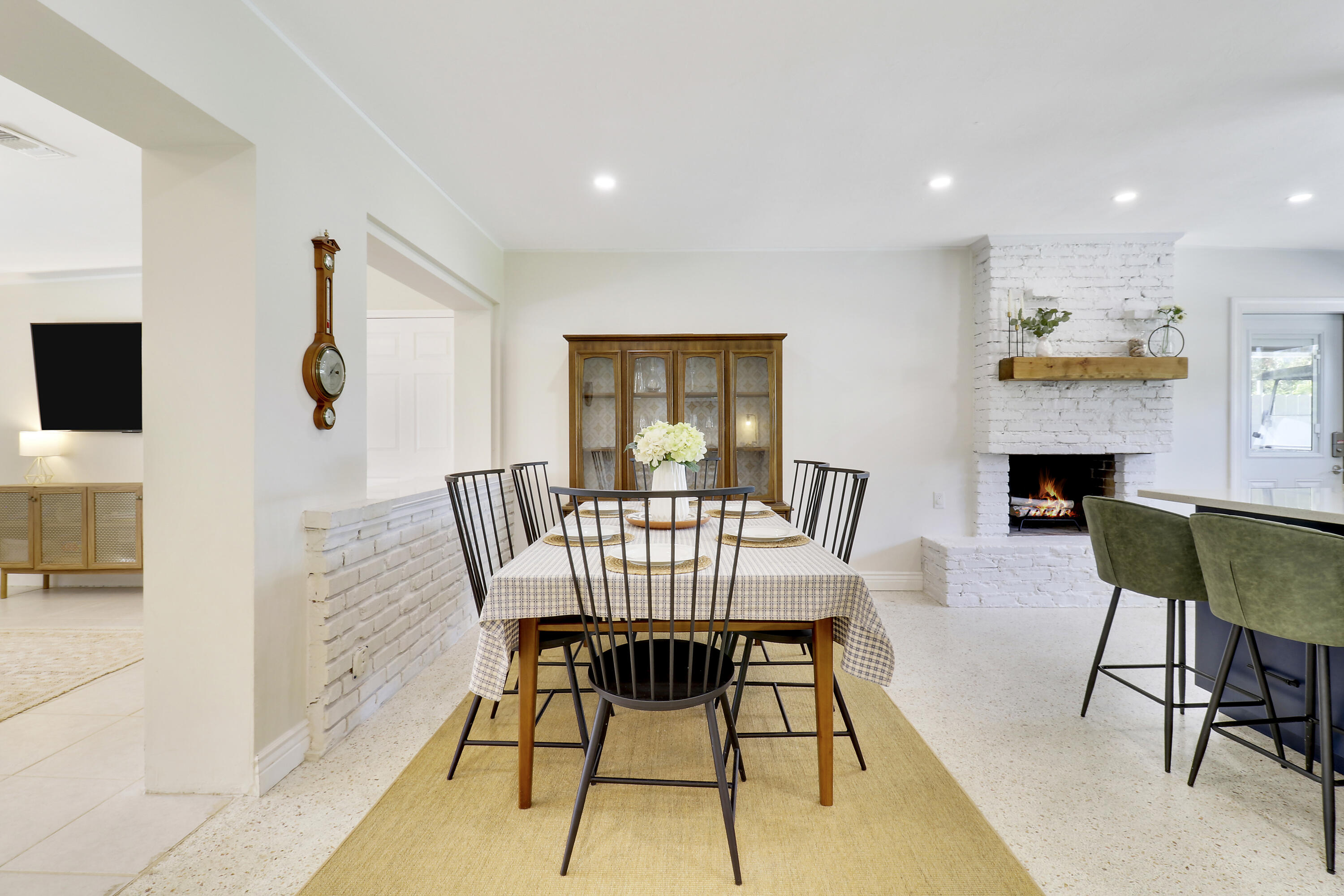 520 Inlet Road North Palm Beach, FL 33408 - Photo 19 of 51 a view of a livingroom with furniture a fireplace and wooden floor