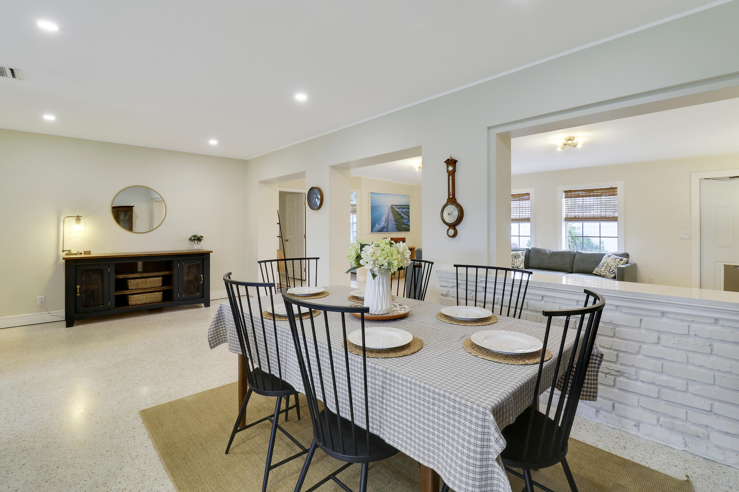 520 Inlet Road North Palm Beach, FL 33408 - Photo 28 of 51 a view of a dining room with furniture and a fireplace