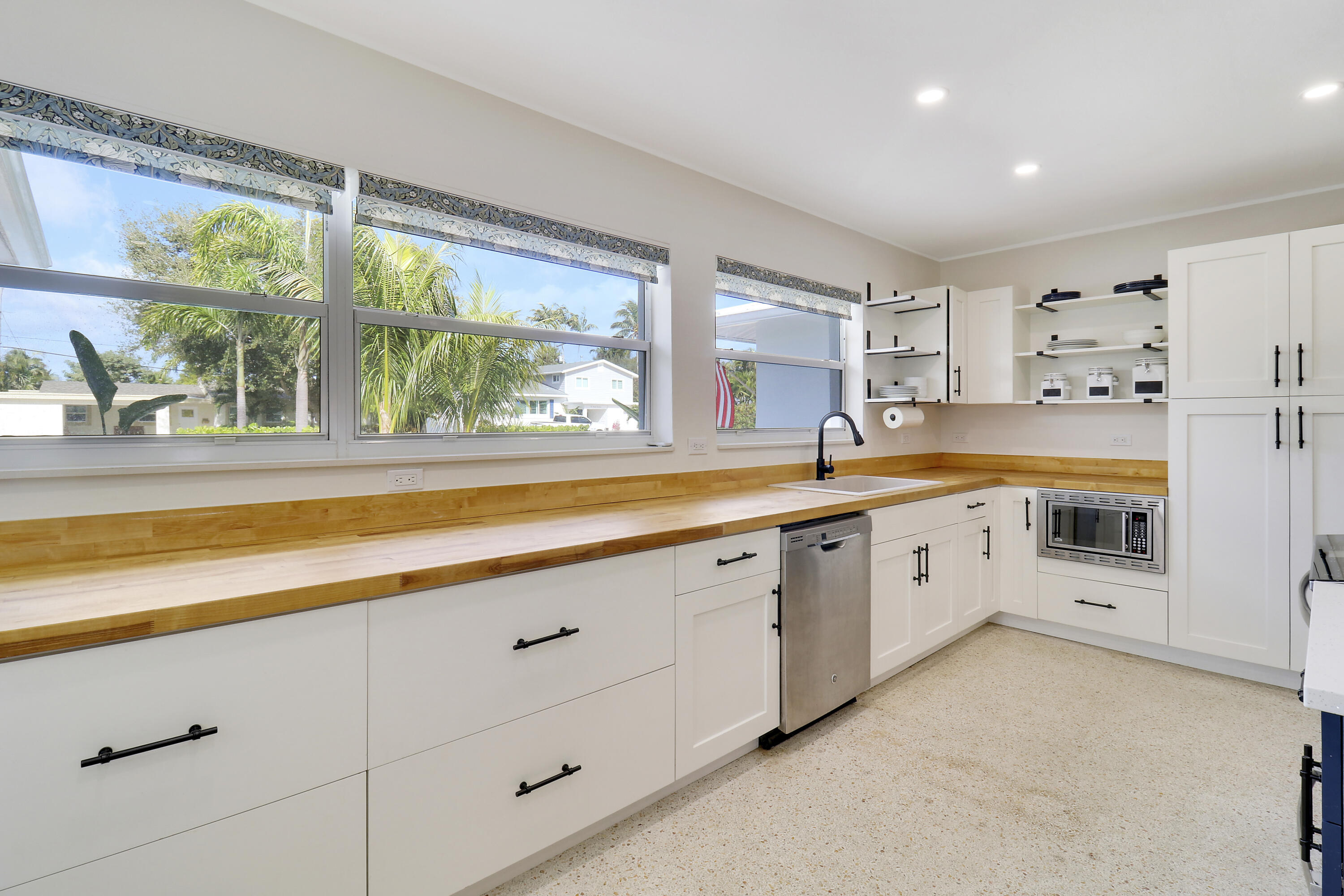 520 Inlet Road North Palm Beach, FL 33408 - Photo 36 of 51 a large white kitchen with a large window
