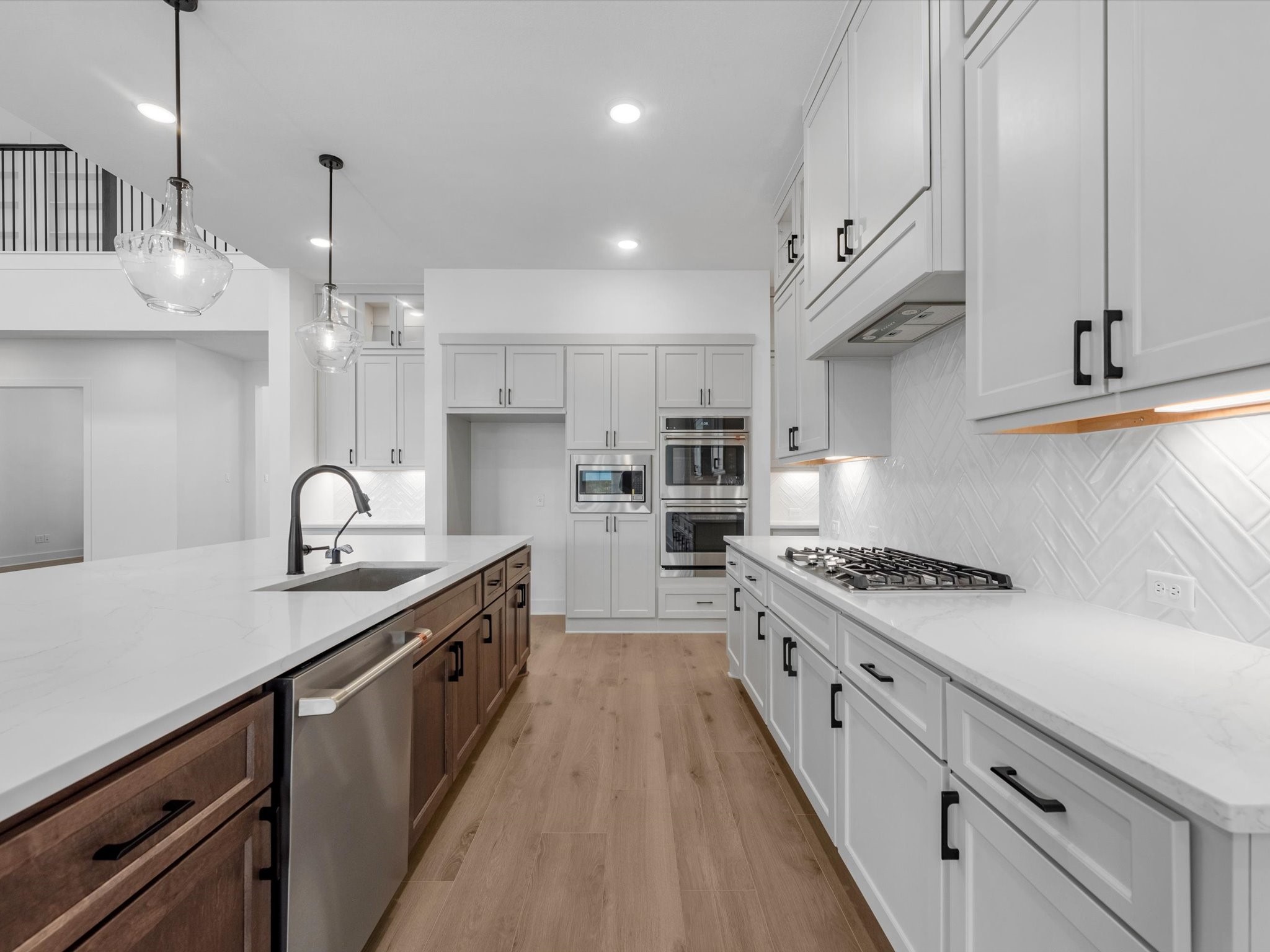 28117 Fox Bnd Drive Spring, TX 77386 - Photo 3 of 26 a large kitchen with stainless steel appliances granite countertop a sink a stove and a refrigerator