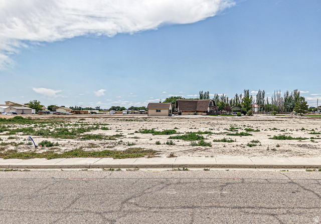 84 White Sage Avenue, Unit 2 Delta, UT 84624 - Photo 12 of 18 Expansive undeveloped land parcel featuring existing curb and gutter infrastructure