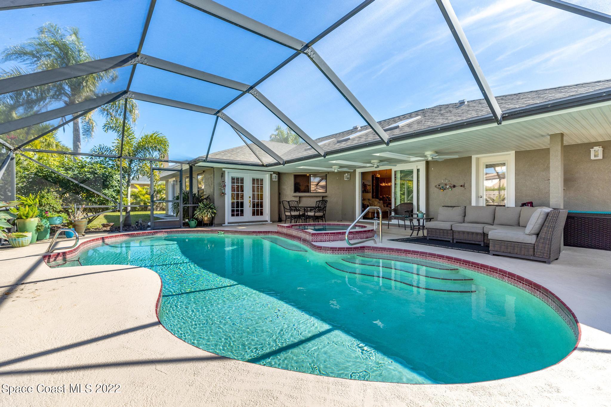 470 Veracruz Boulevard Indialantic, FL 32903 - Photo 16 of 25 a view of a house with swimming pool
