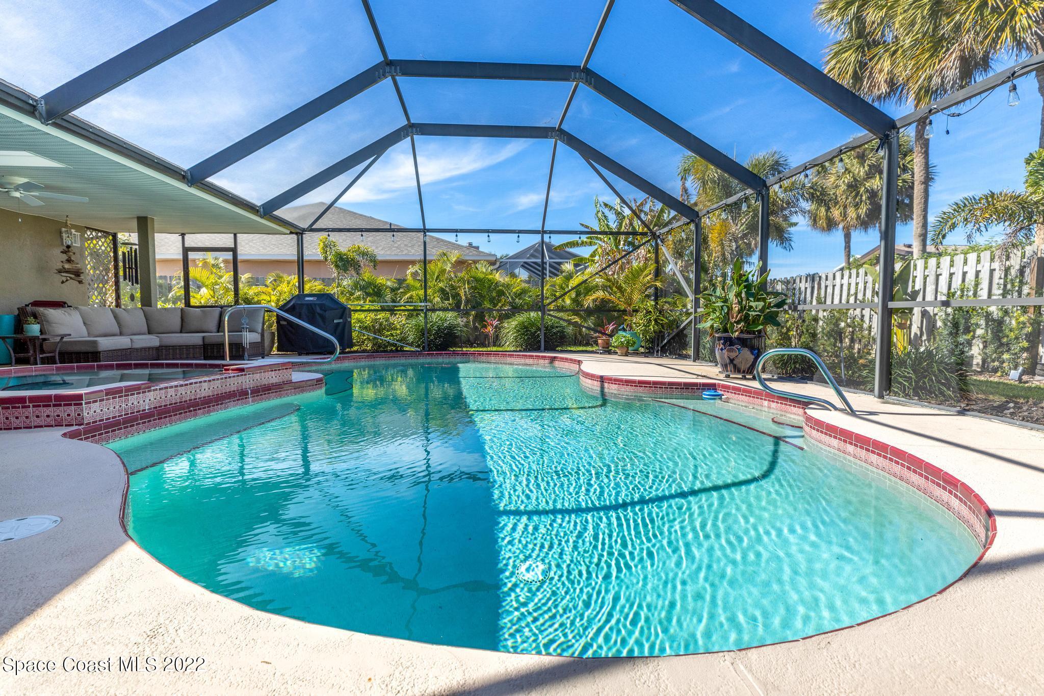 470 Veracruz Boulevard Indialantic, FL 32903 - Photo 17 of 25 a view of a swimming pool with a patio