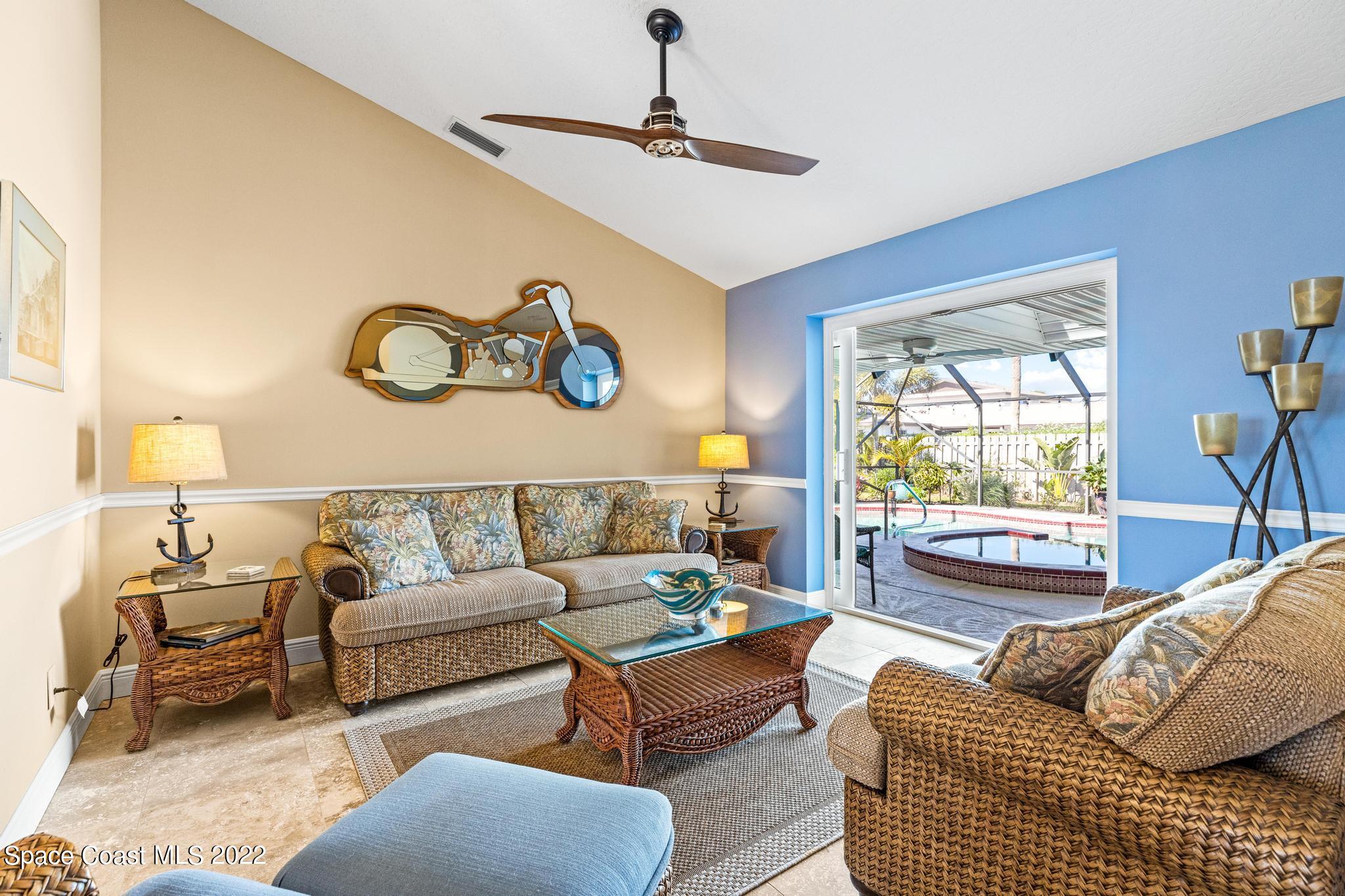 470 Veracruz Boulevard Indialantic, FL 32903 - Photo 2 of 25 a living room with furniture and a window
