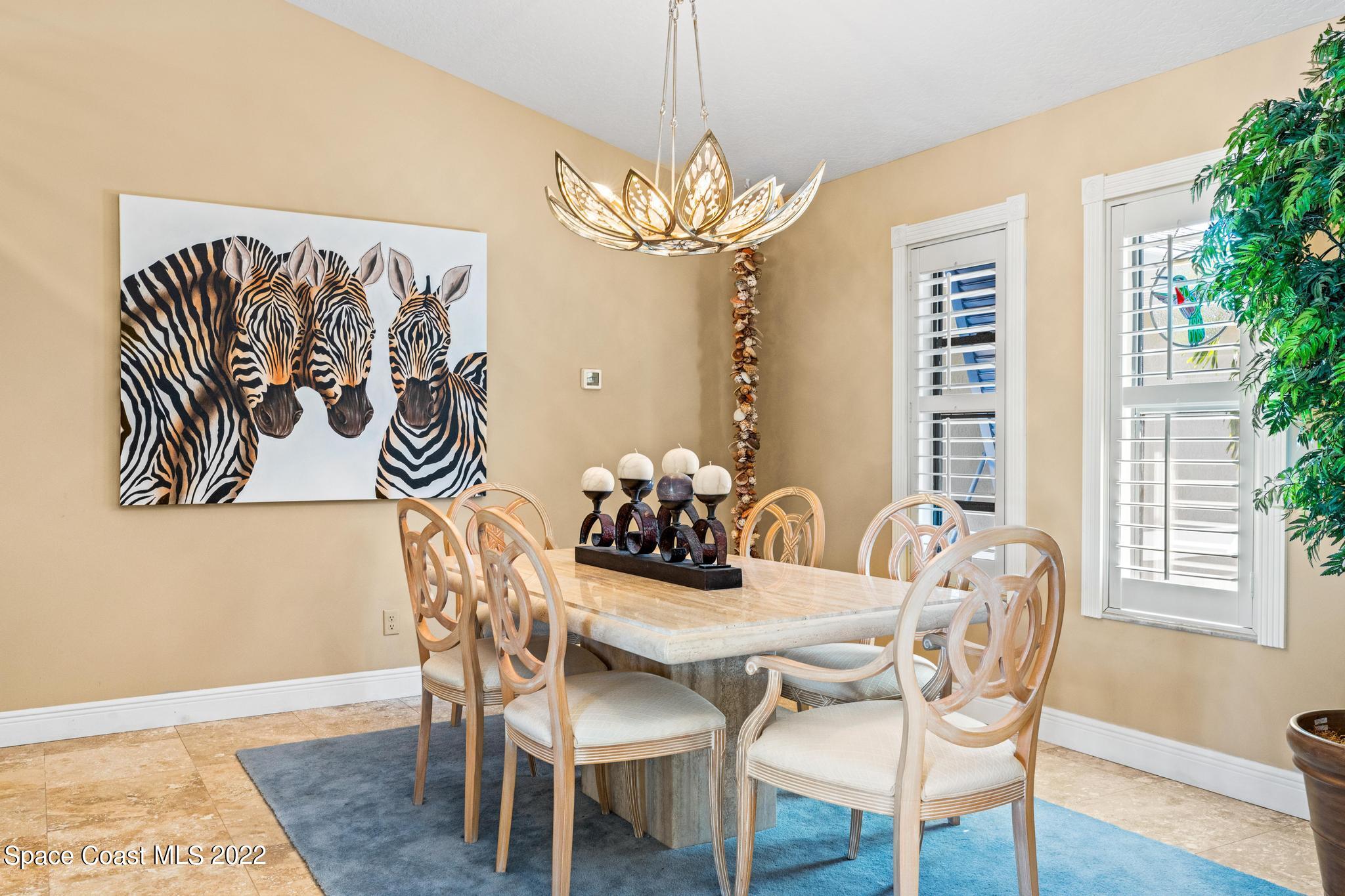 470 Veracruz Boulevard Indialantic, FL 32903 - Photo 3 of 25 a dining room with furniture and window