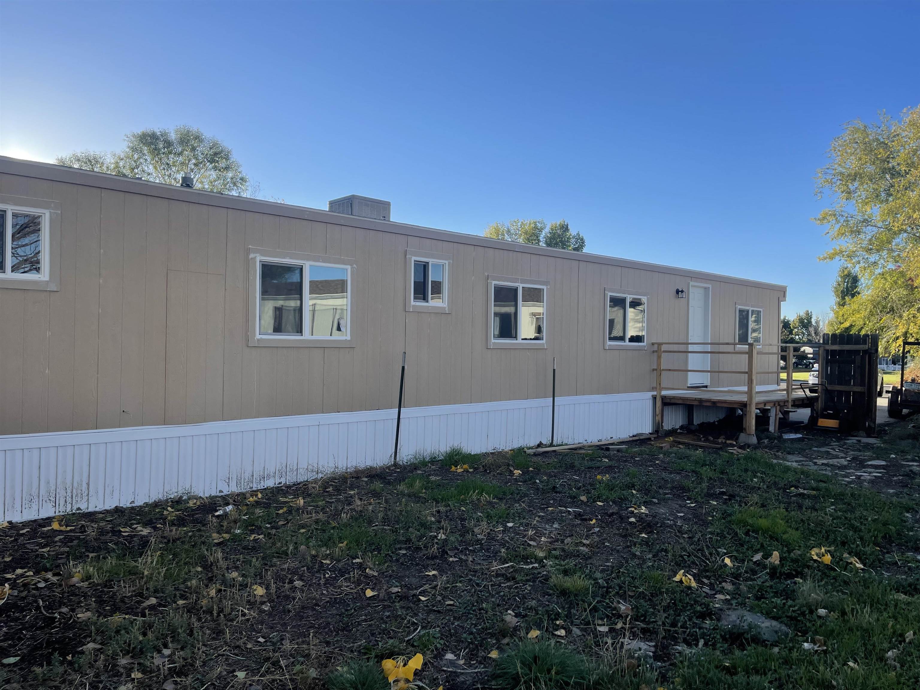 420 Pisces Circle Fruita, CO 81521 - Photo 11 of 12 a backyard of a house with wooden fence