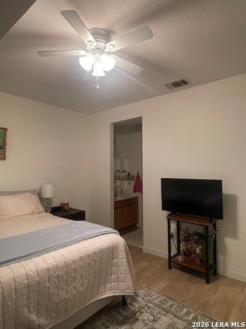 3803 Maverick Crk Road San Antonio, TX 78247 - Photo 13 of 17 a bedroom with a bed and a television