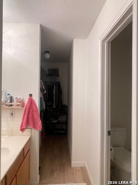 3803 Maverick Crk Road San Antonio, TX 78247 - Photo 14 of 17 a view of walk in closet with clothes and shoes