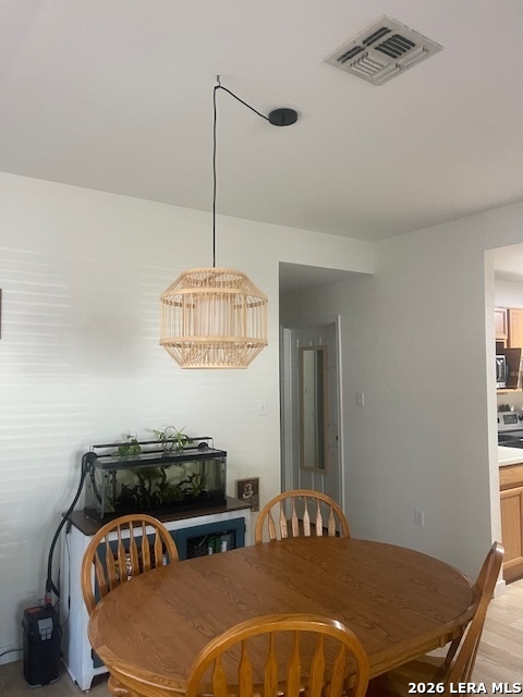 3803 Maverick Crk Road San Antonio, TX 78247 - Photo 7 of 17 a bedroom with a bed and a chandelier