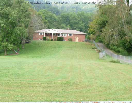 137 Meander Lane Elkview, WV 25071 - Photo 8 of 8 Land/Lot. Back yard: Over 1 acre fully enclosed with fence.