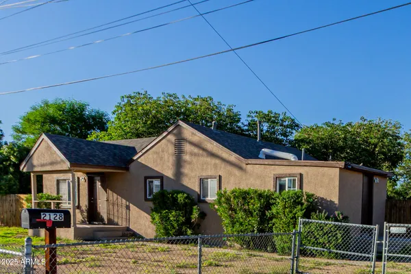 a house view with a garden space