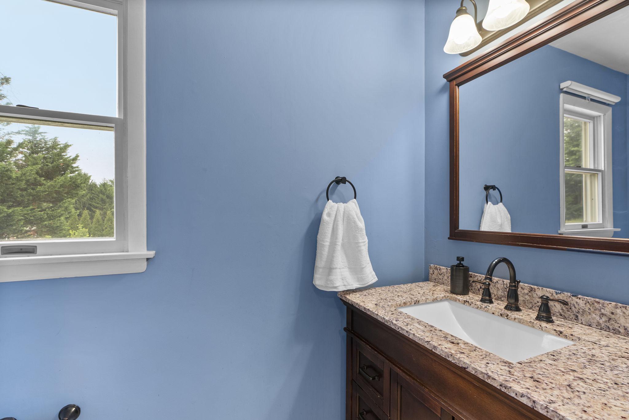 2908 Michelle Road Manchester, MD 21102 - Photo 14 of 34 Beautiful bathroom sink cabinet, mirror & lighting