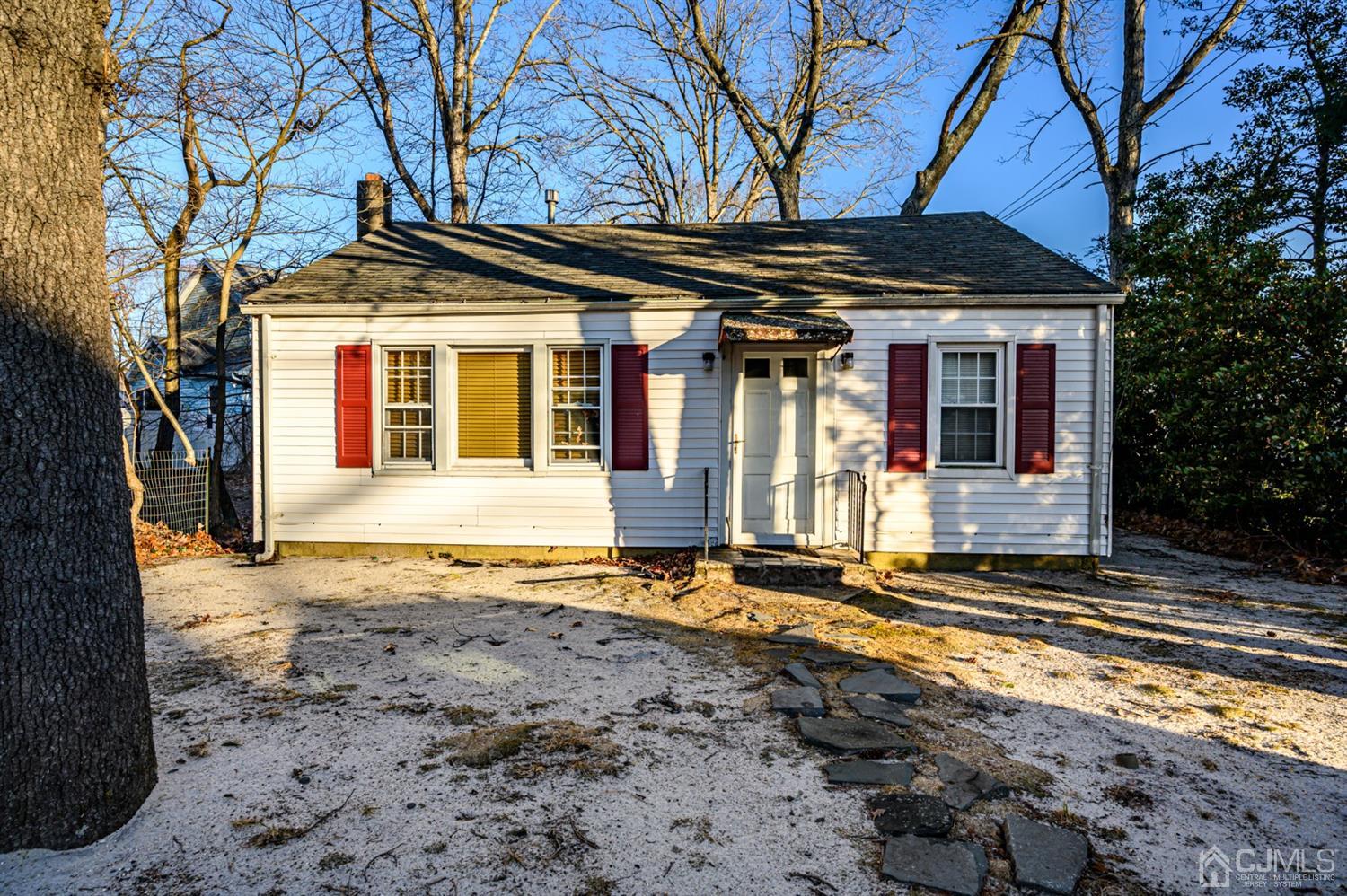 11 Holly Road Brick, NJ 08723 - Photo 1 of 28 a front view of a house with a yard