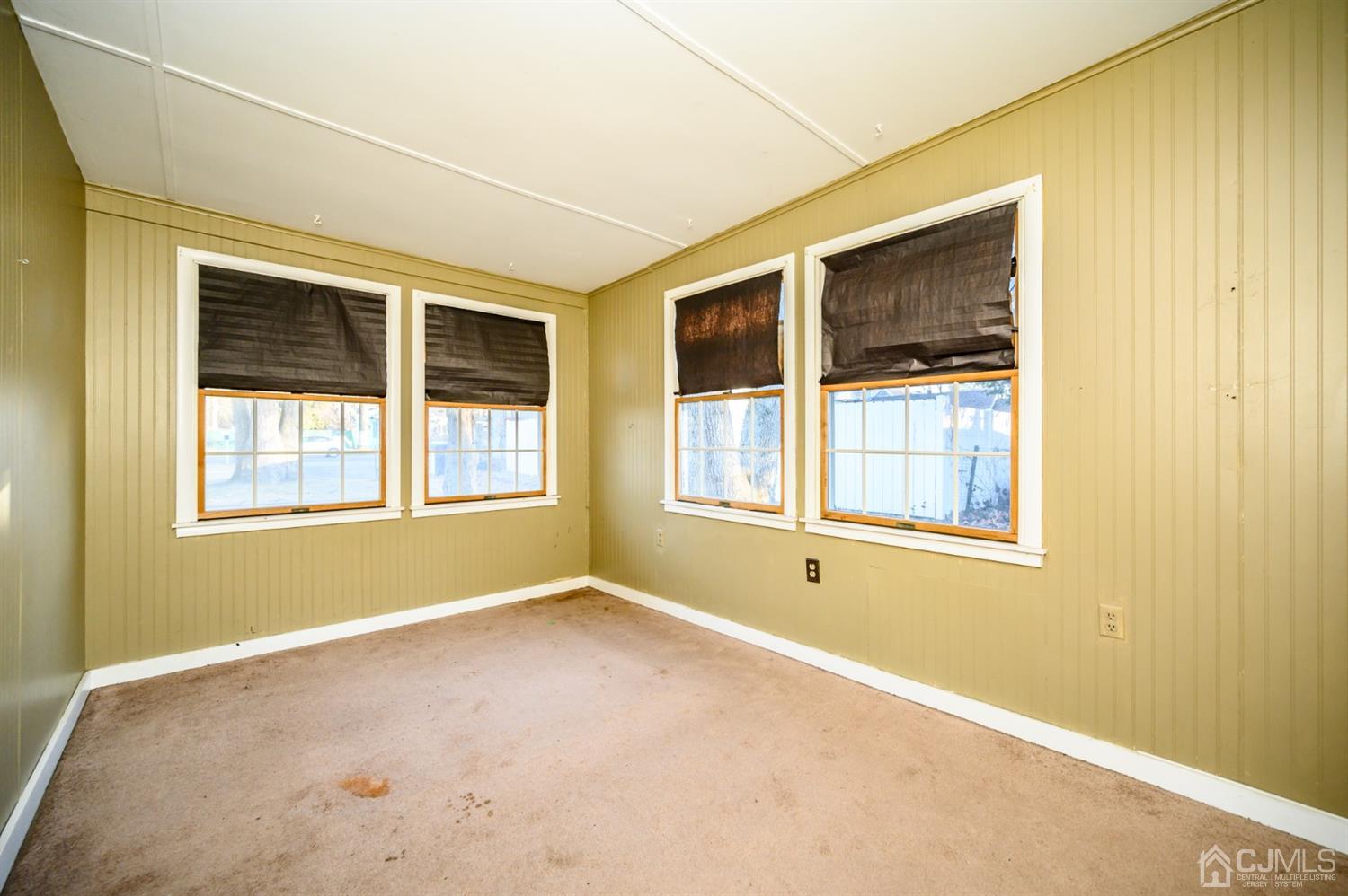 11 Holly Road Brick, NJ 08723 - Photo 12 of 28 a view of an empty room with a window