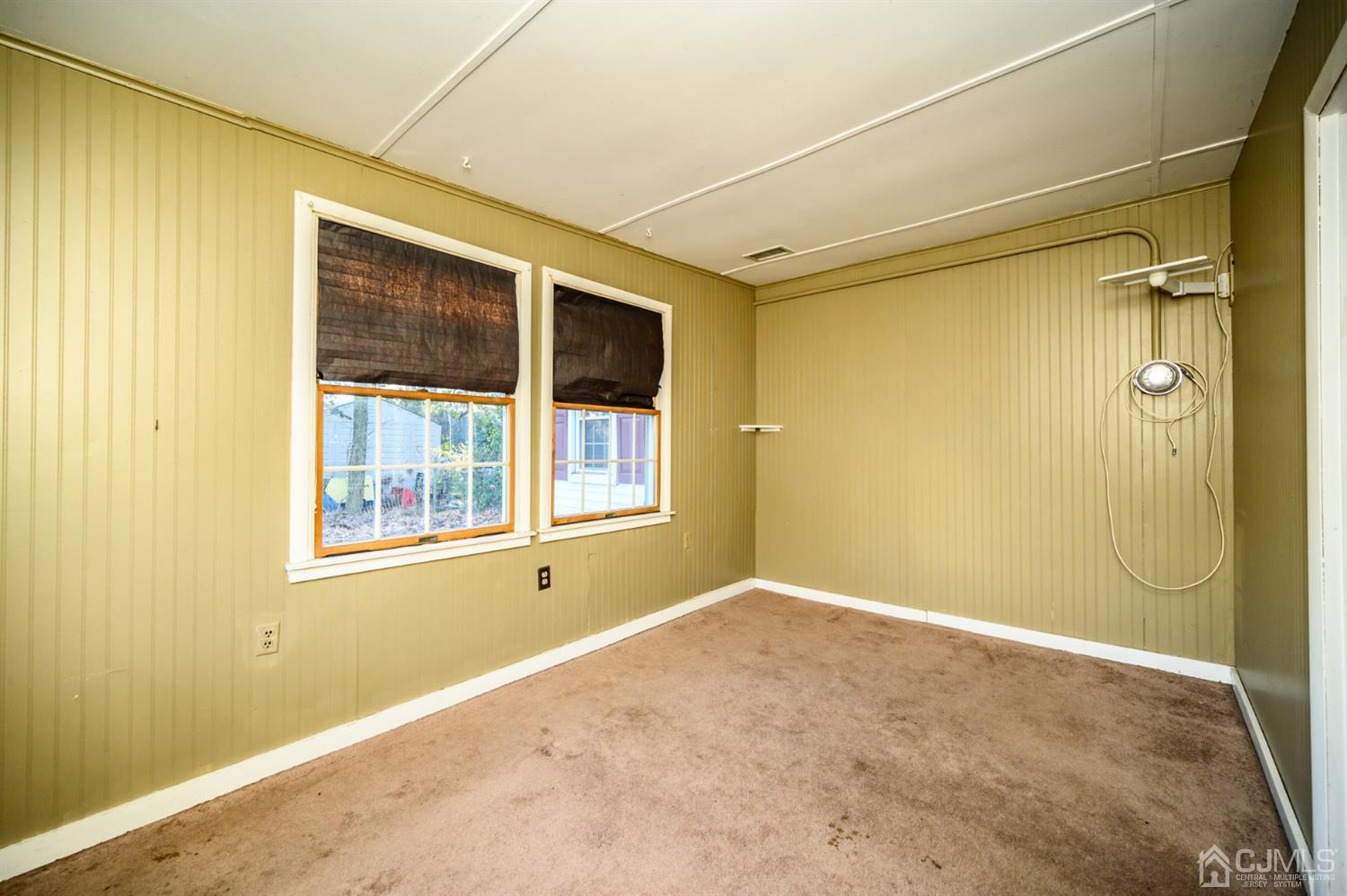 11 Holly Road Brick, NJ 08723 - Photo 13 of 28 a view of an empty room with a window