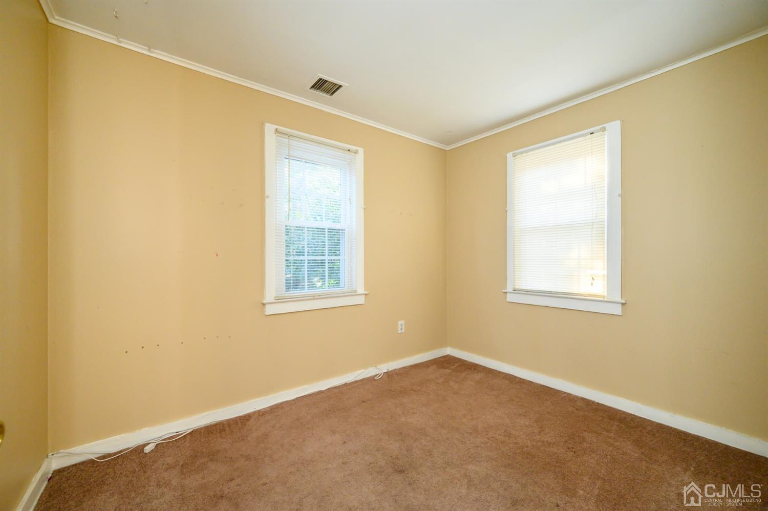 11 Holly Road Brick, NJ 08723 - Photo 15 of 28 a view of an empty room with a window