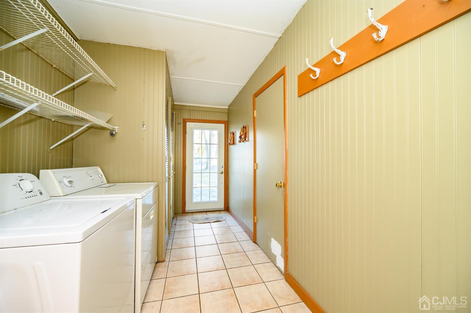 11 Holly Road Brick, NJ 08723 - Photo 23 of 28 a utility room with dryer and washer