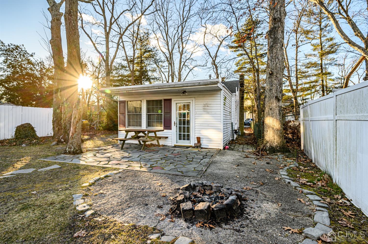11 Holly Road Brick, NJ 08723 - Photo 25 of 28 a view of a yard with a tree