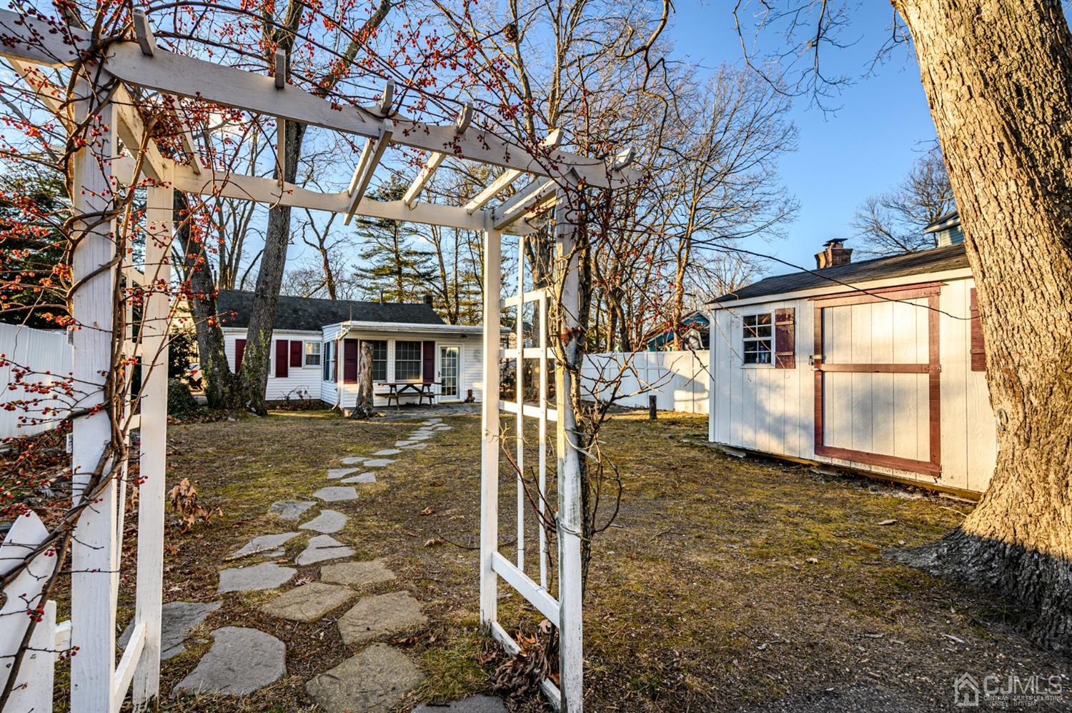 11 Holly Road Brick, NJ 08723 - Photo 27 of 28 a front view of a house with a yard