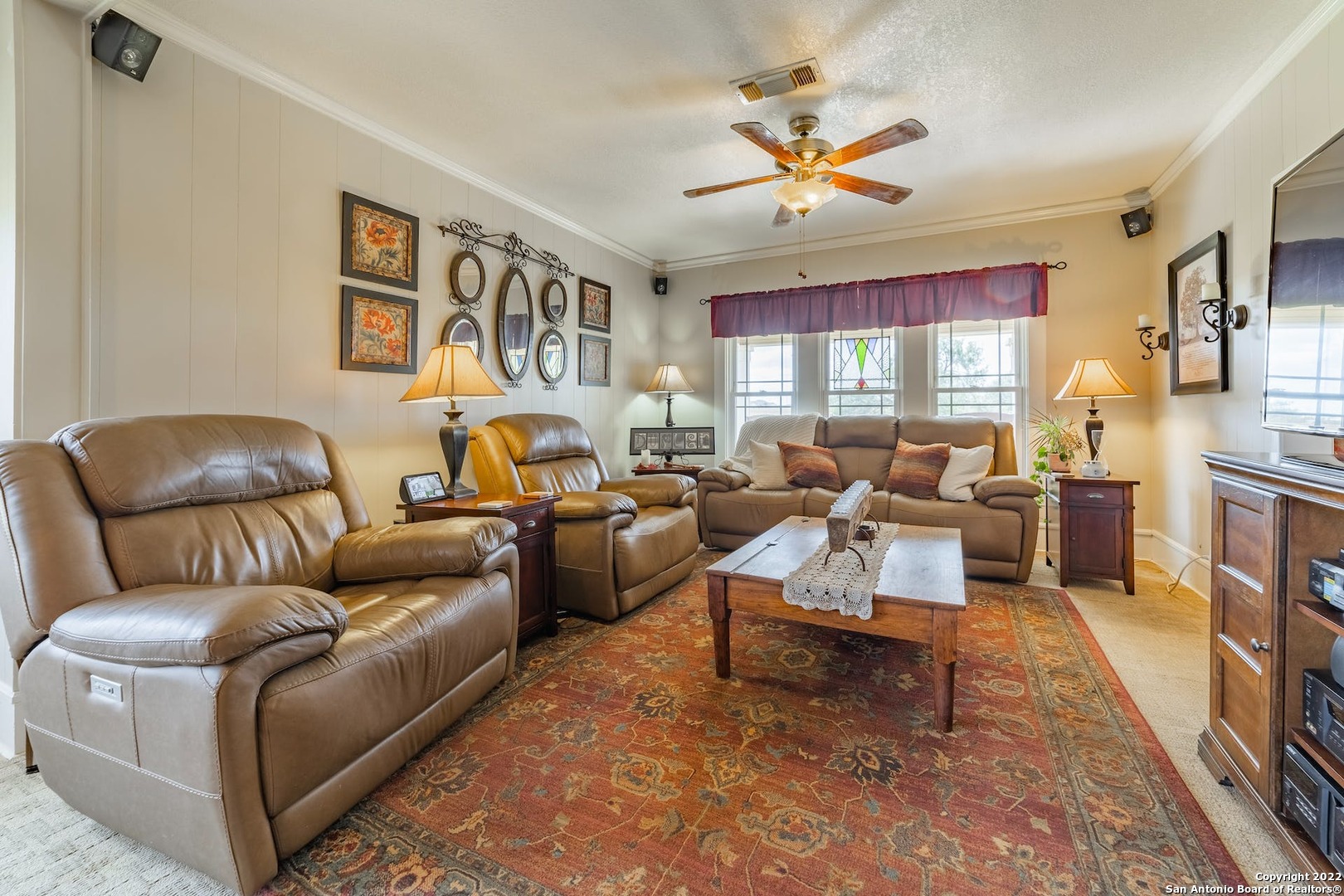 11801 Jim Terrill Road Adkins, TX 78101 - Photo 15 of 46 a living room with furniture and a large window