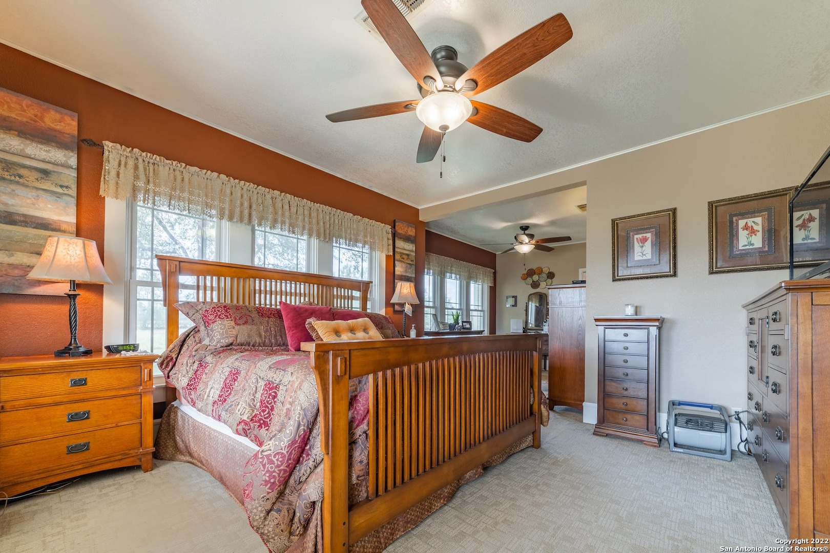 11801 Jim Terrill Road Adkins, TX 78101 - Photo 18 of 46 a bedroom with furniture and windows