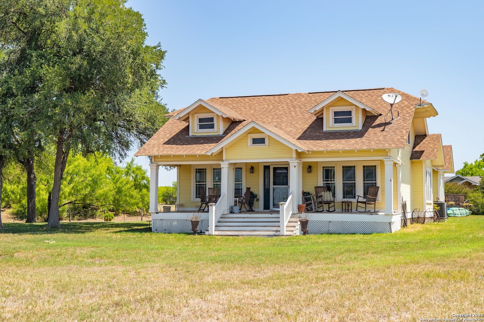 11801 Jim Terrill Road Adkins, TX 78101 - Photo 2 of 46 a view of a house with a swimming pool