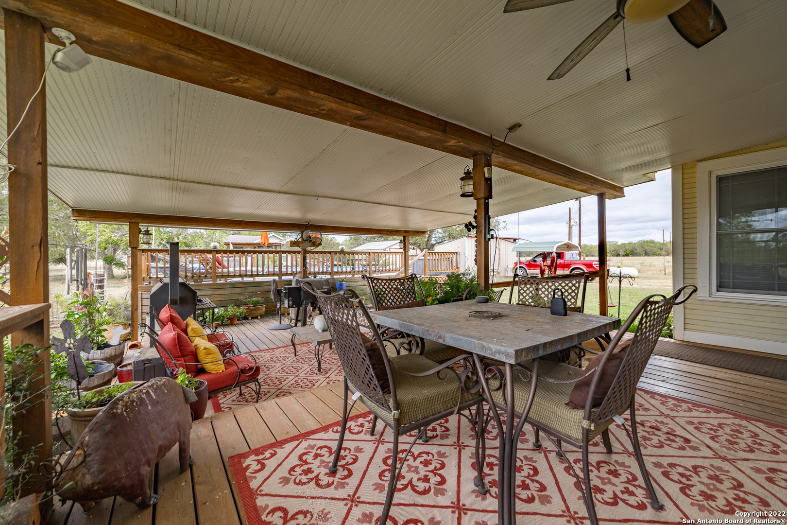 11801 Jim Terrill Road Adkins, TX 78101 - Photo 25 of 46 a view of an outdoor dining space with furniture