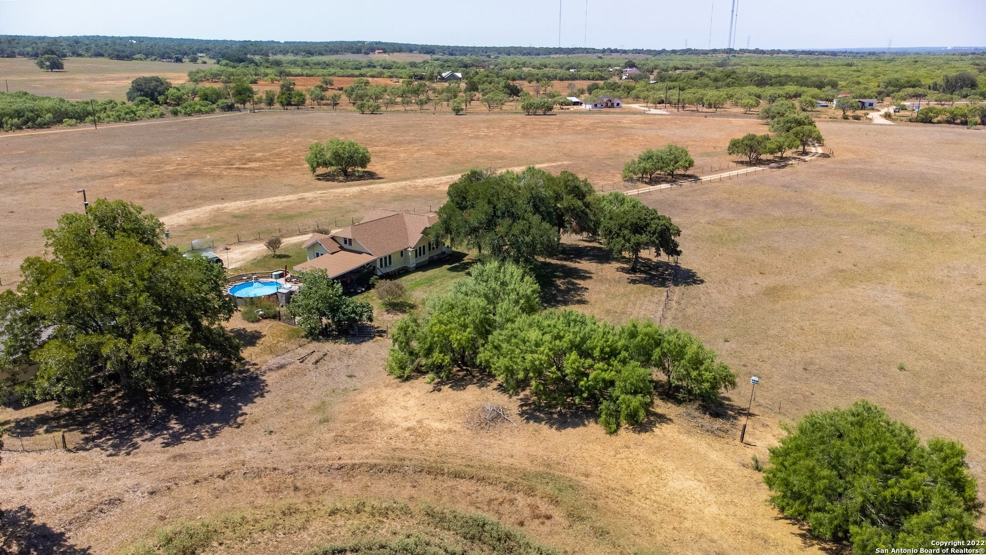 11801 Jim Terrill Road Adkins, TX 78101 - Photo 32 of 46 a view of a lake with beach and city view