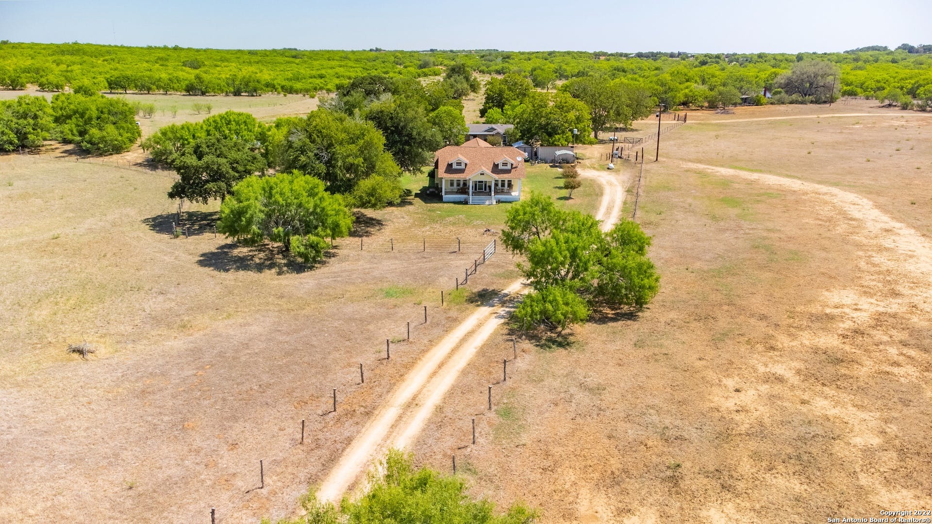 11801 Jim Terrill Road Adkins, TX 78101 - Photo 34 of 46 a view of a lake with beach and mountain view