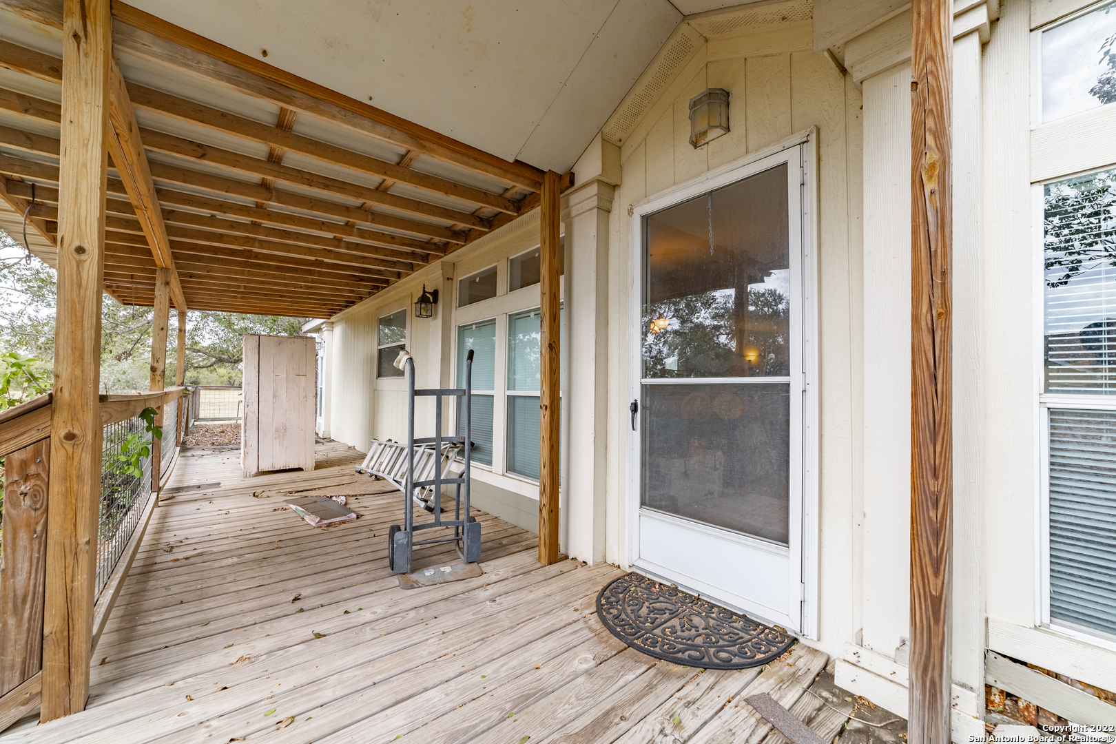 11801 Jim Terrill Road Adkins, TX 78101 - Photo 40 of 46 a view of outdoor space with wooden floor and seating space
